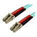 StarTech.com 7 m OM4 LC to LC Multimode Duplex Fiber Optic Patch Cable - Aqua - 50/125 - Fiber Optic Cable - 40/100Gb - LSZH (45